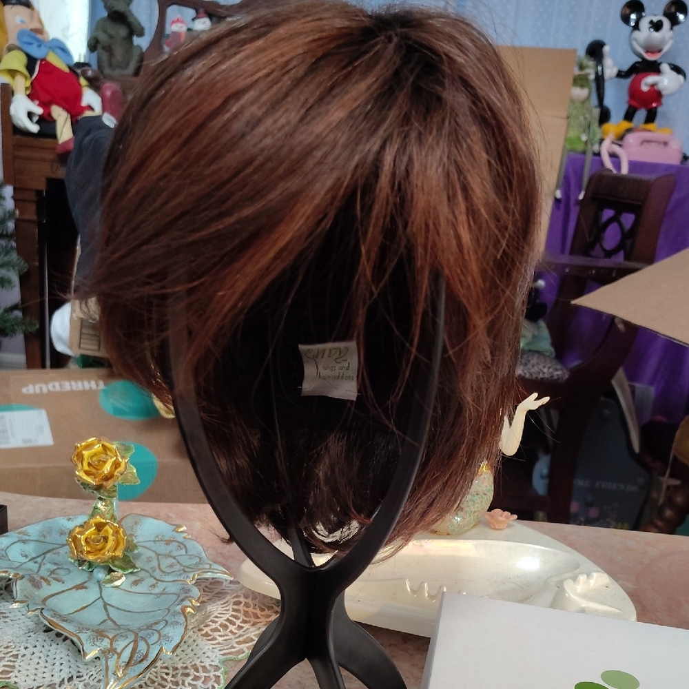 Envy Whitney 30% Human Hair And 70% Heat Friendly Fiber's.